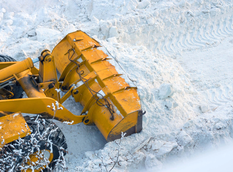 snow removal using an excavator