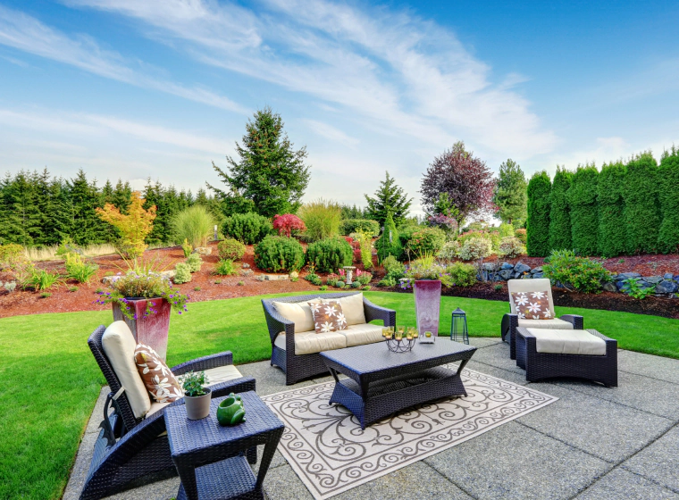 outdoor area with living space and lawn design